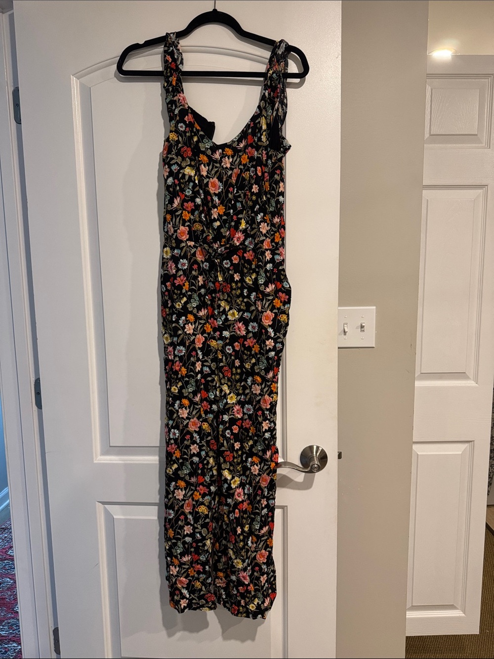 LOFT Black Floral Sleeveless Jumpsuit with Pink Orange and Green Accents